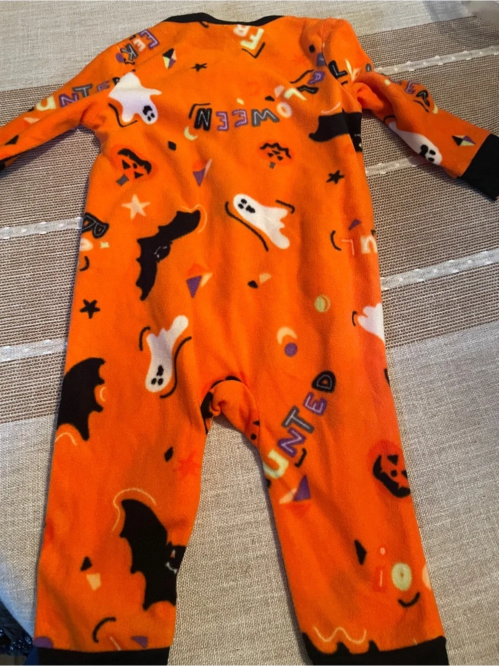 Orange Baby Sleepwear with Black Trim and Purple & White Ghosts